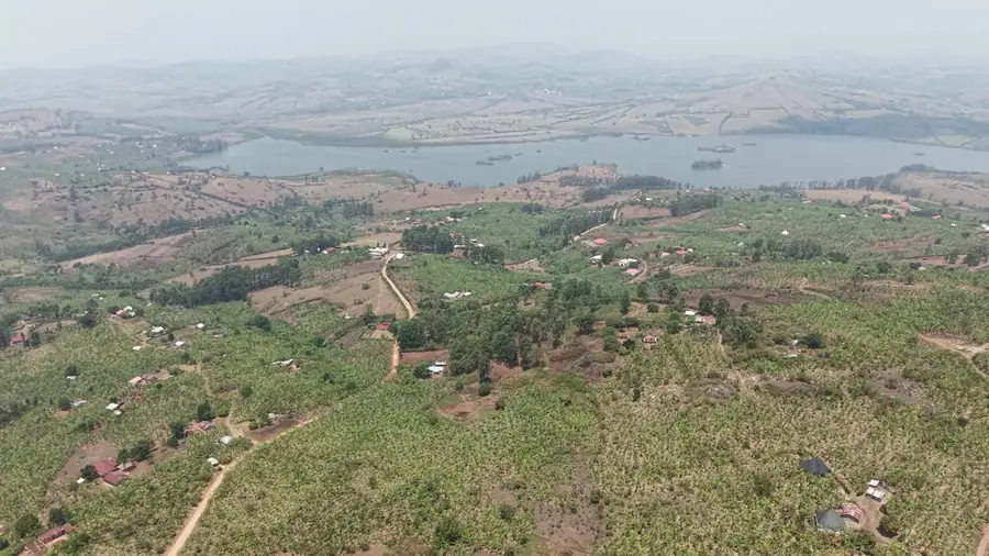 Aerial view climbing over the Ankole highlands toward Lake Nyabihoko