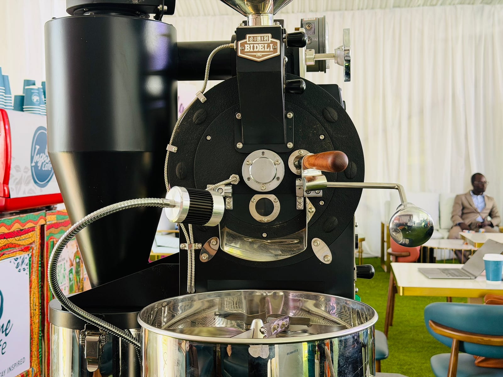 A sample coffee roaster running on the Africa Coffee Park stand at the Coffee & Cocoa Expo.