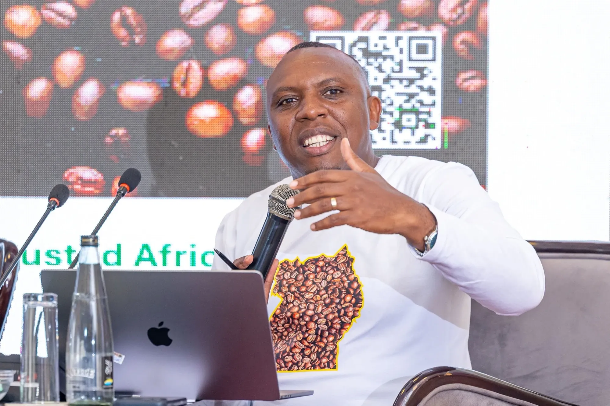 Dr. Nelson Tugume, CEO of Inspire Africa, speaking on the ECD panel at Mestil Hotel, Kampala.