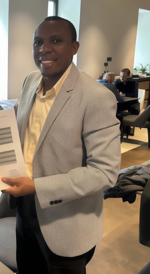 Nelson Tugume at a business meeting