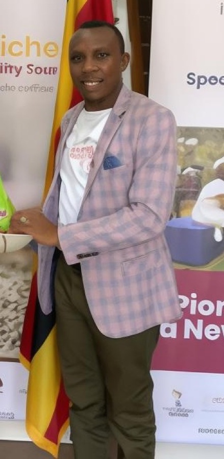 Nelson Tugume representing Inspire Africa Coffee at an industry event